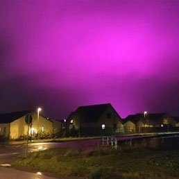 Sky Over Swedish Town Turns Purple At Night